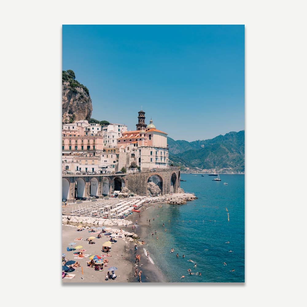 Atrani Amalfi Coast cliffside scene with vibrant houses and beach umbrellas – coastal Italian wall art for a serene, inviting home decor.