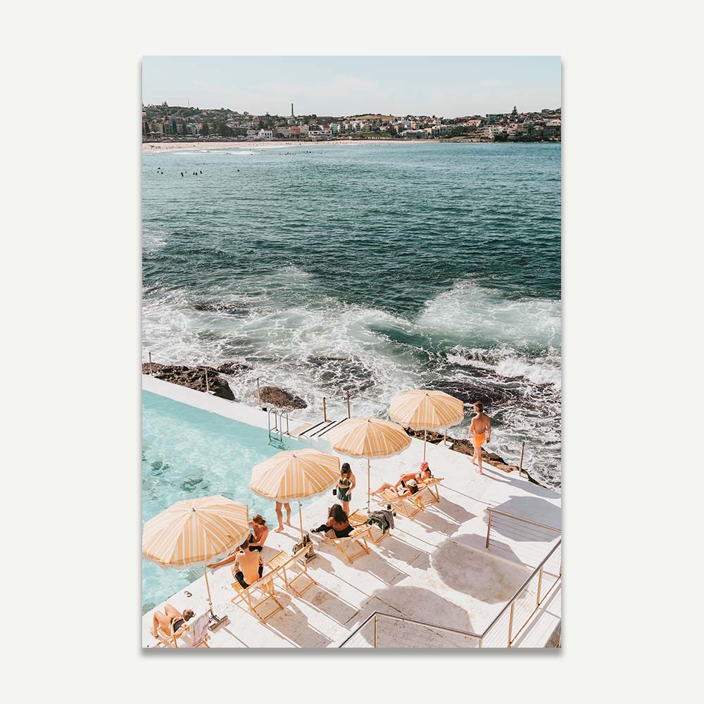 Iconic Bondi Icebergs ocean pool with cheerful yellow umbrellas, perfect for modern home decor.