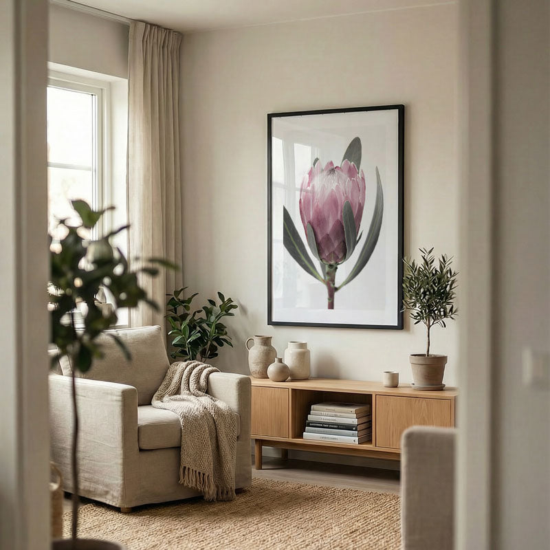 Living room with a couch, coffee table, and decorative items.