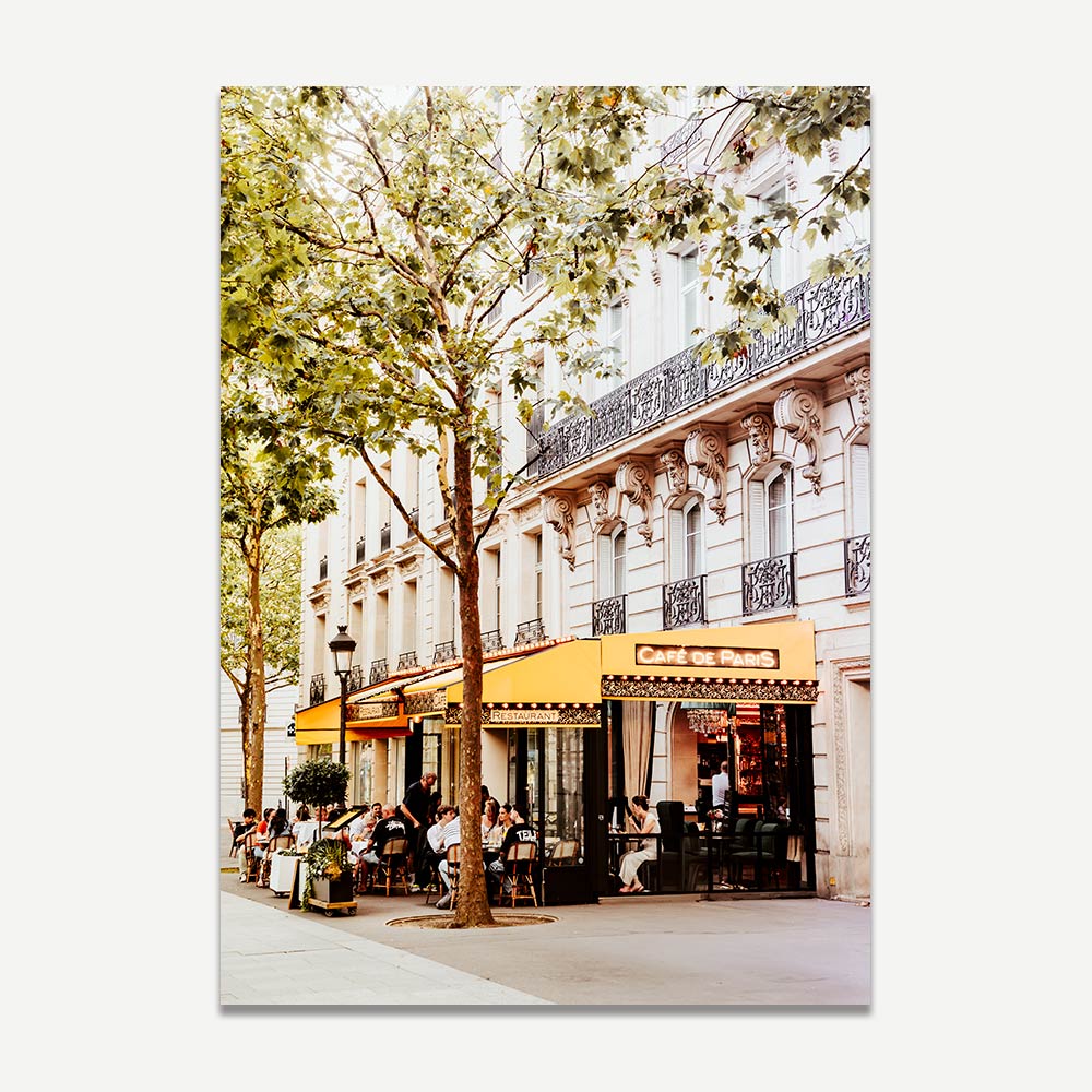 Warm tones of a Paris café with menu stand, perfect for framed art or modern wall art in dining rooms.
