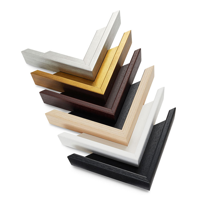 Set of various wooden picture frames on a white background