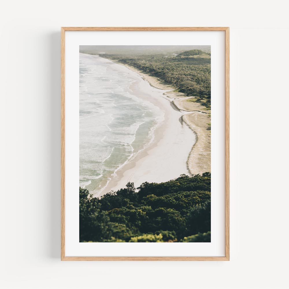 Discover the artistic allure of Cape Byron, Byron Bay, Australia, in this fine art print showcasing a beautiful aerial view.