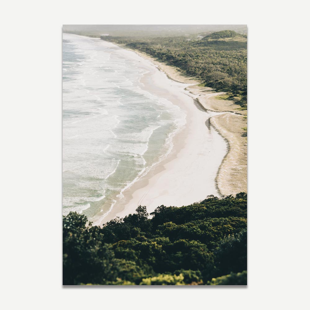 Transform your home decor with the serene charm of Cape Byron, Byron Bay, Australia, depicted in this mesmerizing aerial view print.