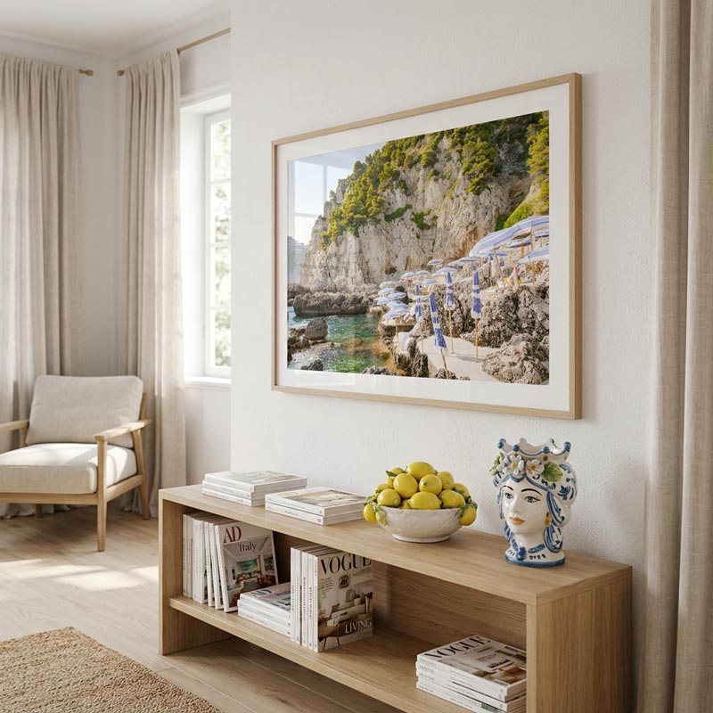 Living room with a wooden shelf, framed picture, and decorative items.