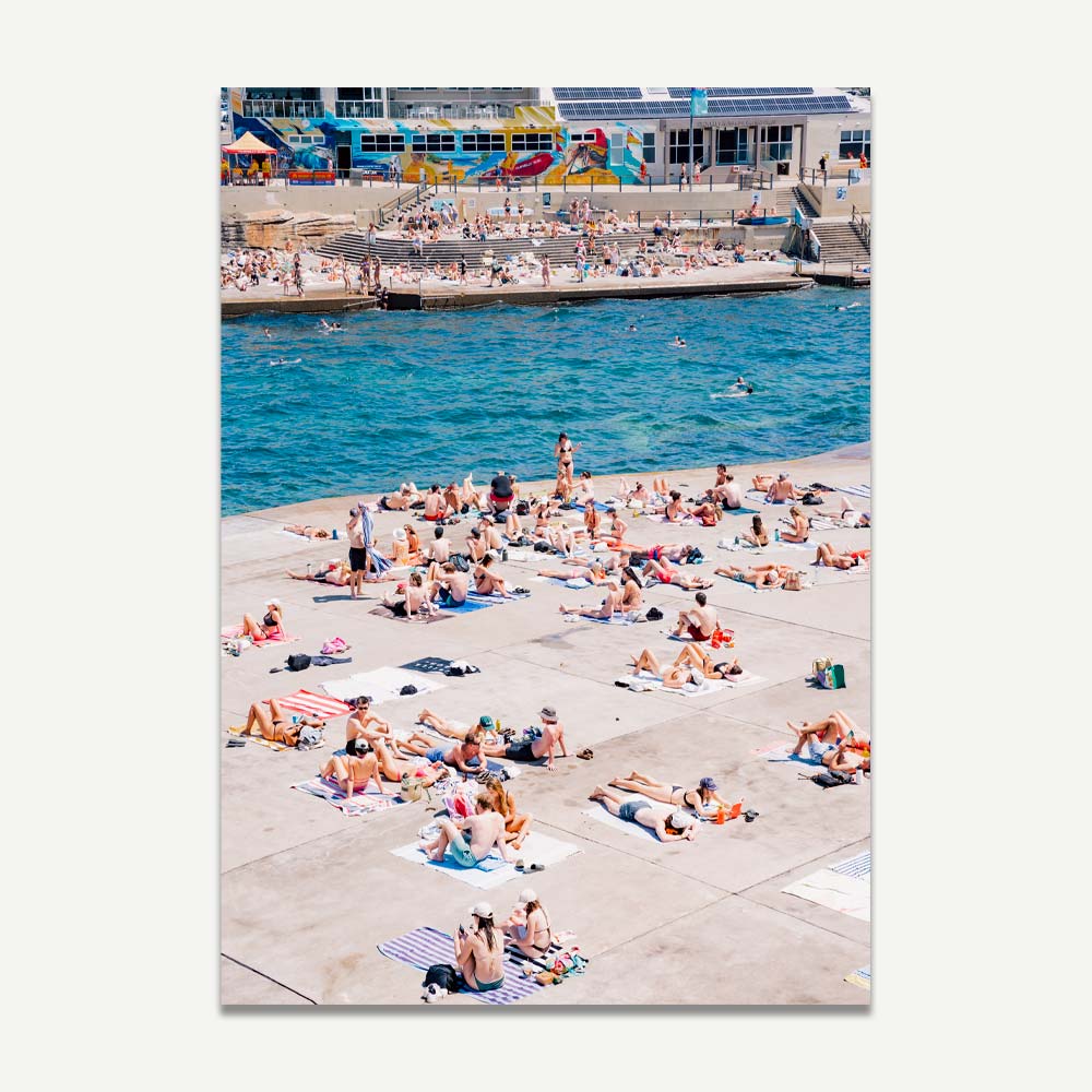 Sunbathers enjoying the serene beachscape at Chapter V, Clovelly, Sydney - Ideal for Home Decor and Wall Art.