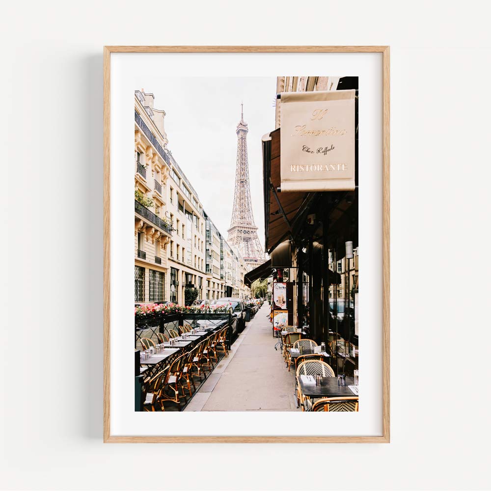 Beautiful Parisian street scene with the Eiffel Tower in the background, offering a romantic Parisian vibe.
