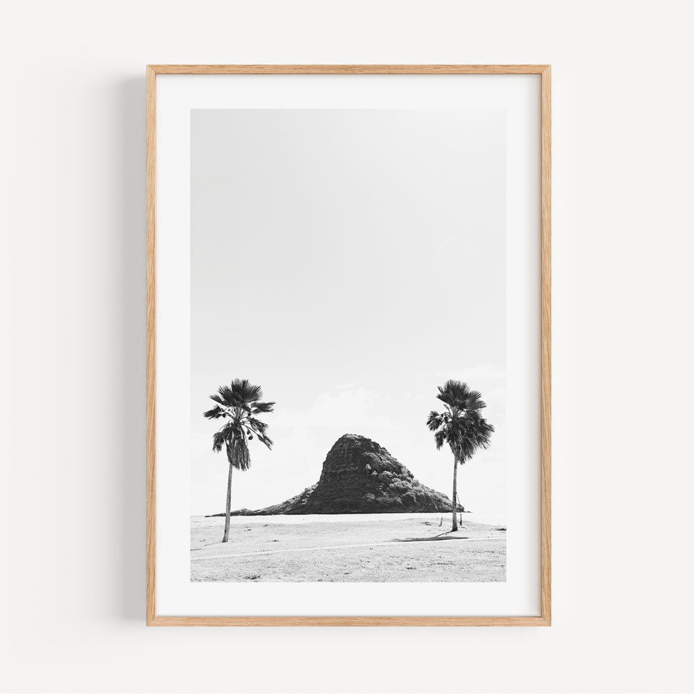 Iconic black and white silhouette of China Man's Hat, Oʻahu - Enhance your space with modern canvas prints.
