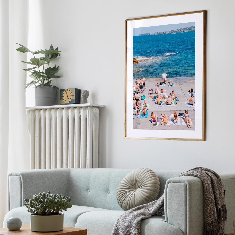 Tranquil scene at Clovelly, Sydney: Sunbathers enjoying the beach - Ideal for modern wall art and canvas prints.