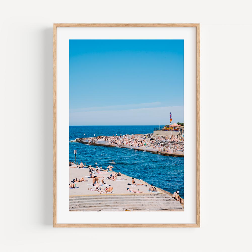 Sun-drenched beach day at Clovelly, Sydney: Transform your walls with Framed art and Canvas prints from Oblongshop.