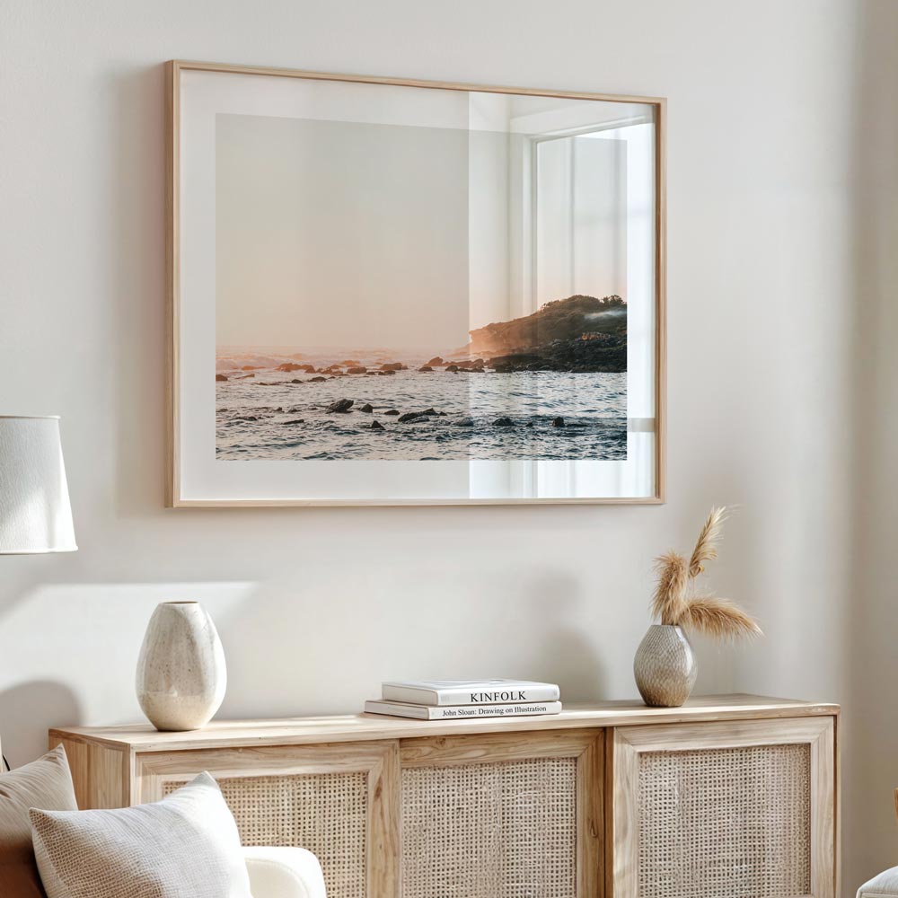 Stunning sunrise at Magic Point Maroubra Beach captured in ocean and rocks photo with natural frame