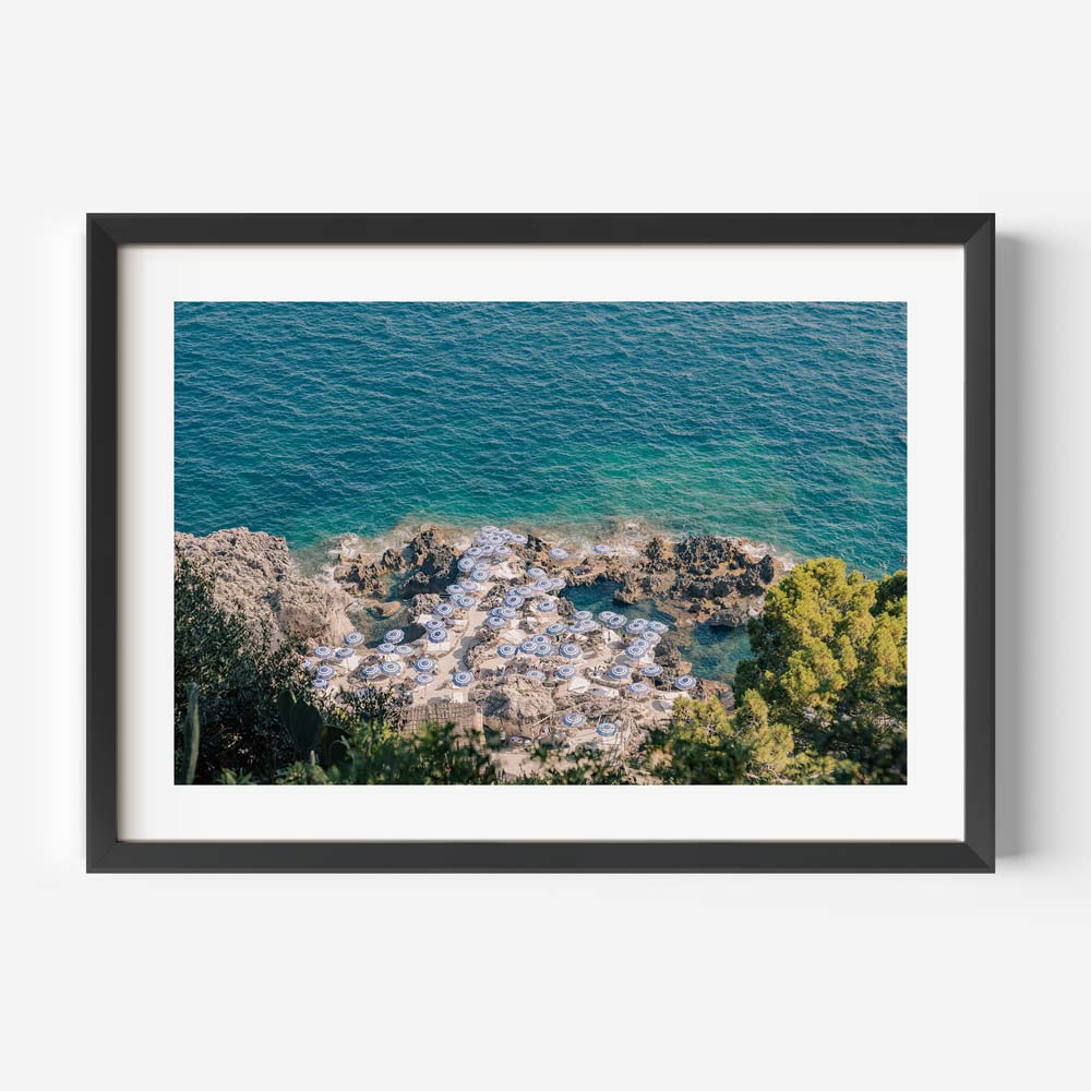  Elevate your walls with the elegance of La Fontelina Beach Club, Capri, through this stunning wall artwork, evoking the essence of sun-kissed coastal escapes.