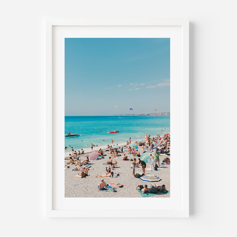 Immerse yourself in the beauty of En Vacances, NICE, CÔTE D'AZUR, FRANCE, where people enjoy the beach - perfect for wall art and home decor