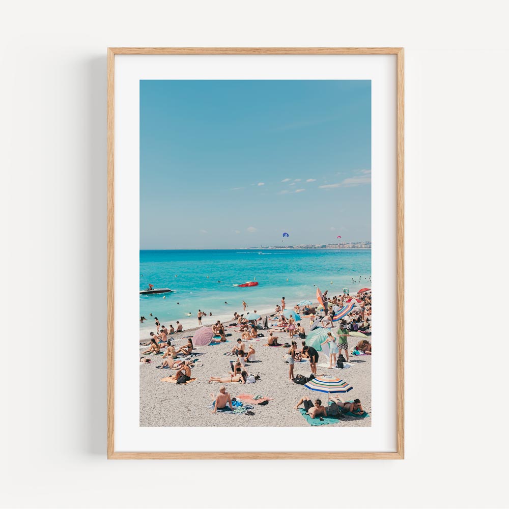 A breathtaking photograph of people enjoying En Vacances, NICE, CÔTE D'AZUR, FRANCE - ideal for wall art and home decor