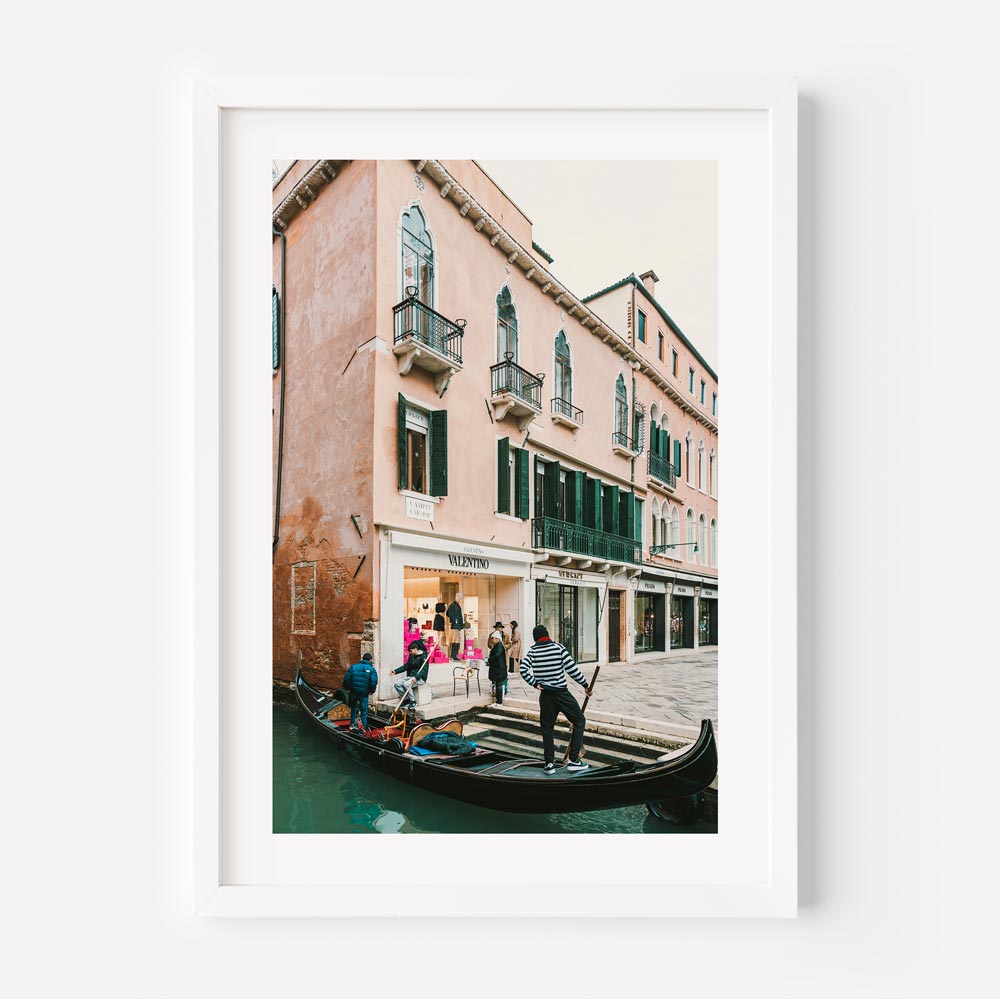 Valentino Venice, Italy: A captivating photograph featuring a boat and a charming building - Perfect for wall art and home decor.