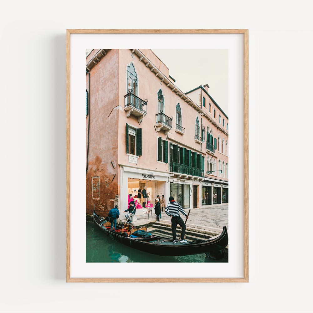 Venetian charm captured in this photograph of Valentino Venice, featuring a boat and a picturesque building - Enhance your space with modern canvas prints.