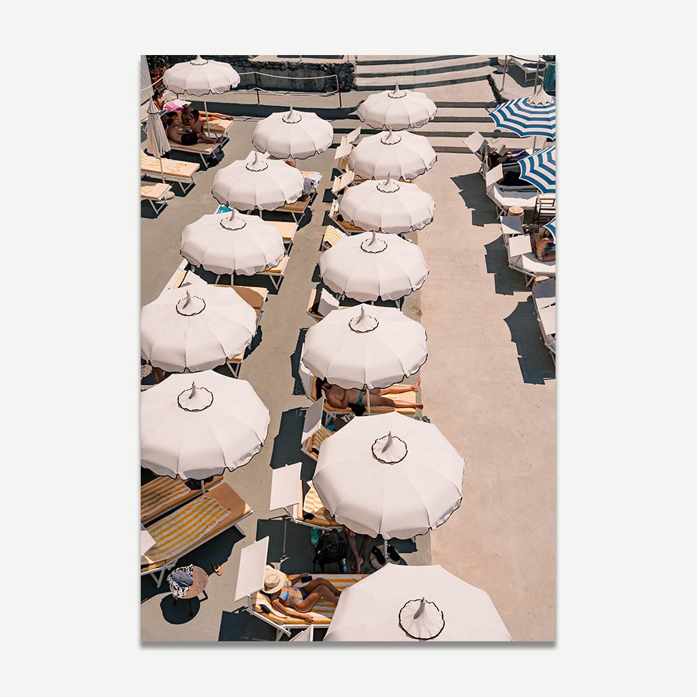 Exclusive wall art of Positano featuring a retro white beach umbrella at Music on the Rock beach club, capturing the elegance and sophistication of Italian coastal living for your home decor.