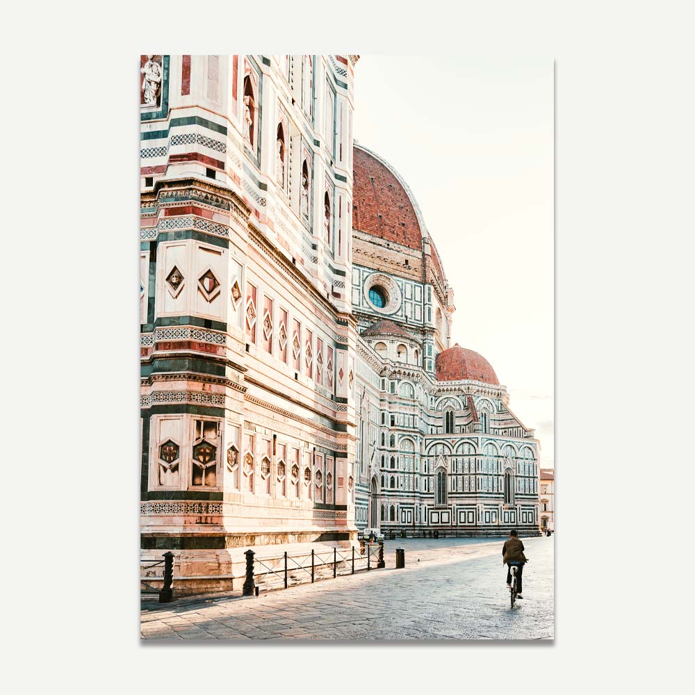 Vintage-style Florence wall art featuring a cyclist riding next to Santa Maria del Fiore – elegant architectural print for Italy-inspired home decor.