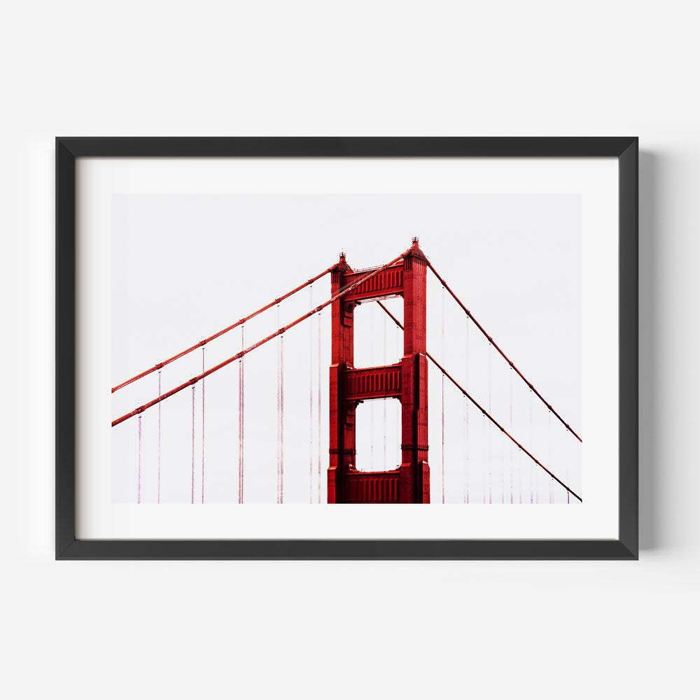 Dreamy canvas print of the Golden Gate Bridge with clouds, evoking mystery and grandeur.