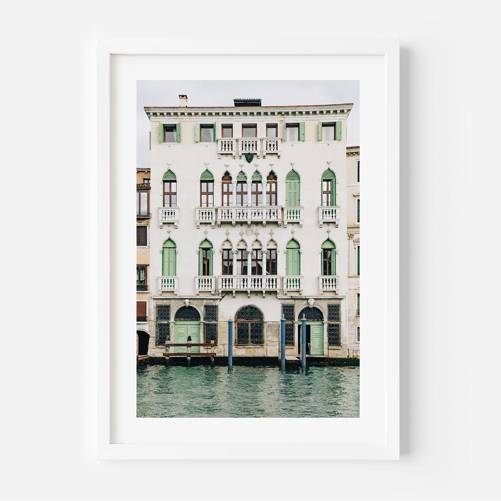 Photo art print of a historic Venetian building with green doors overlooking a calm canal – framed architecture wall art from Venice, Italy