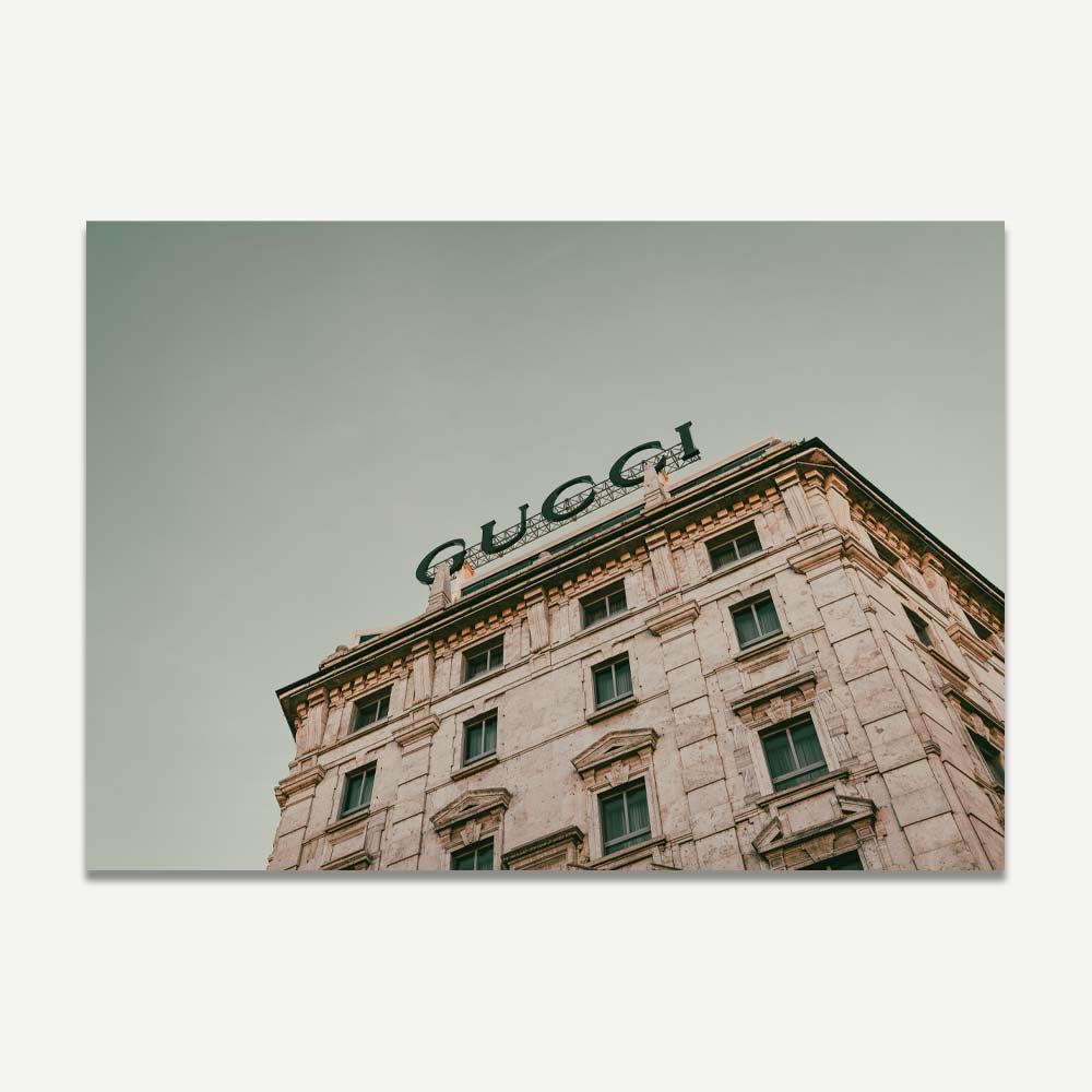 Gucci sign on an old building in Milan – vintage Milan wall art capturing high fashion and architectural elegance for your home decor collection.