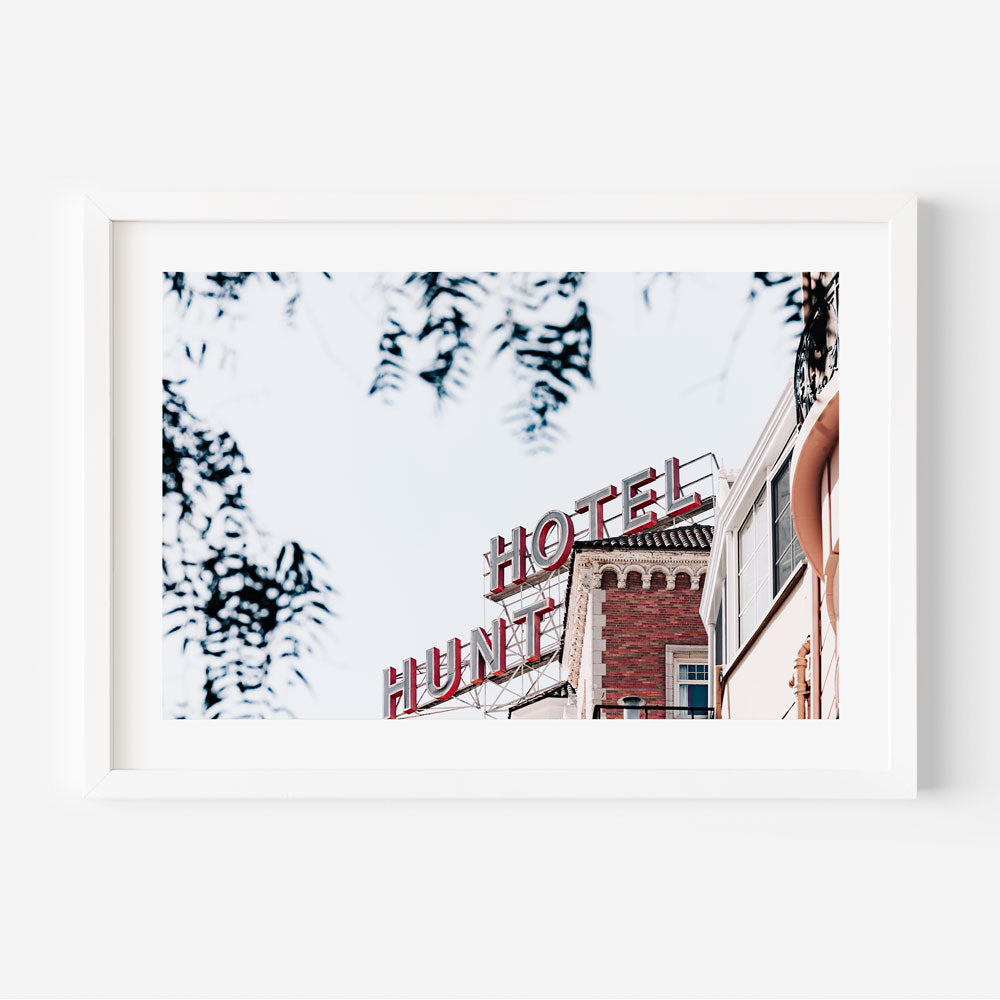 Hotel Huntington wall art featuring the iconic tip of the Huntington Hotel sign in San Francisco.