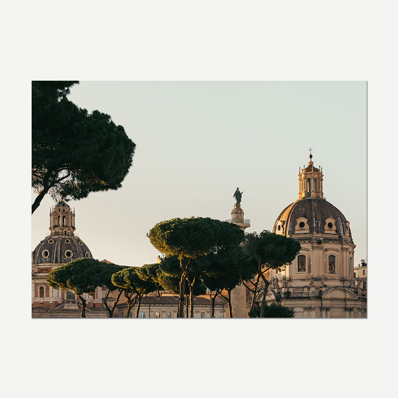 A square art print depicting the historic domes and silhouetted trees of Rome at sunset, presented on a light gray background.
