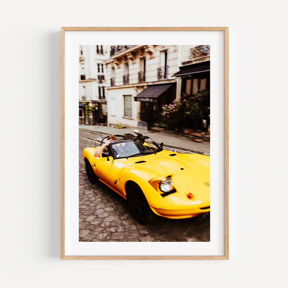 Timeless beauty of Paris captured with a yellow car in wall artwork, perfect for bedroom or office decor.
