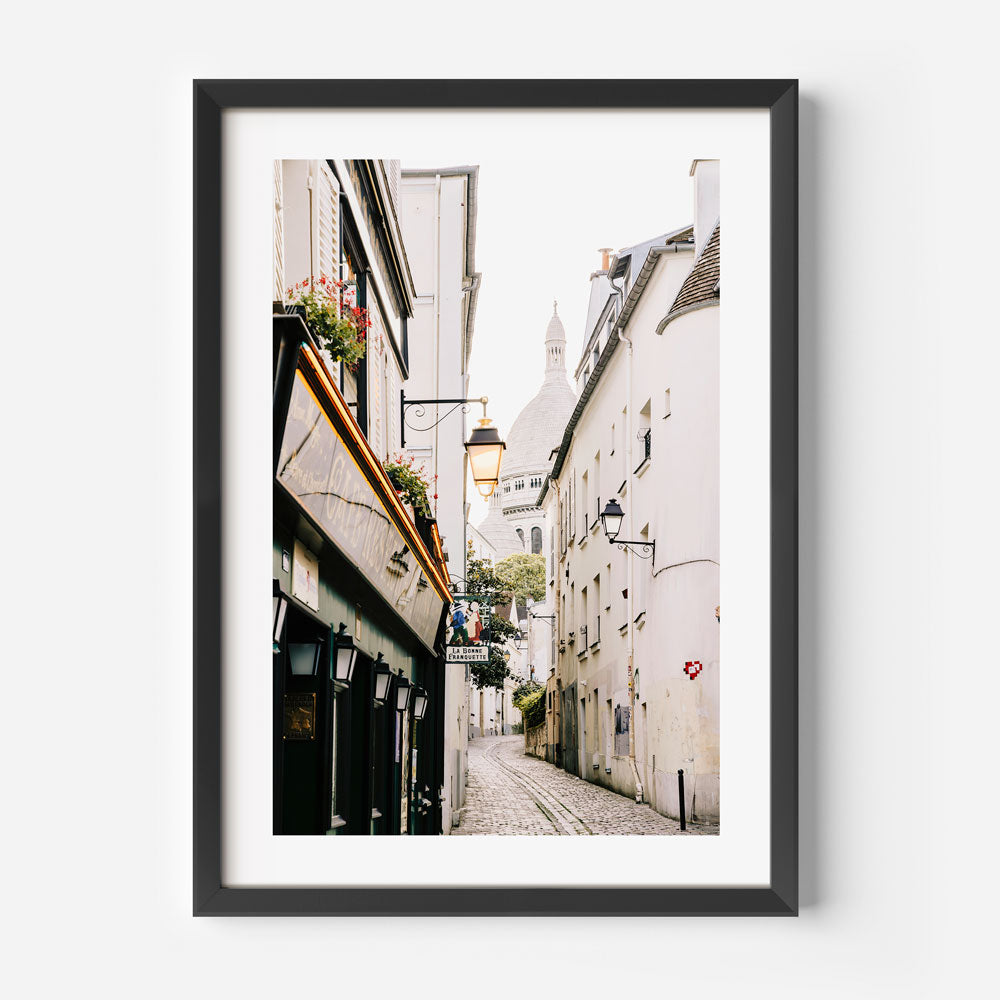 Parisian dawn in Montmartre, showcasing peaceful streets leading to Sacré-Cœur, perfect for home decor.
