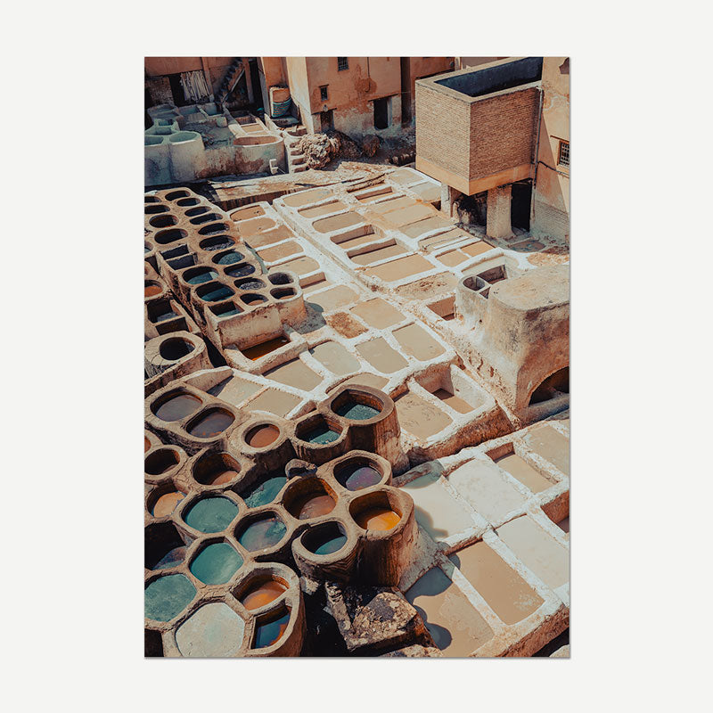 Traditional tannery with vats and leather pieces in Morocco