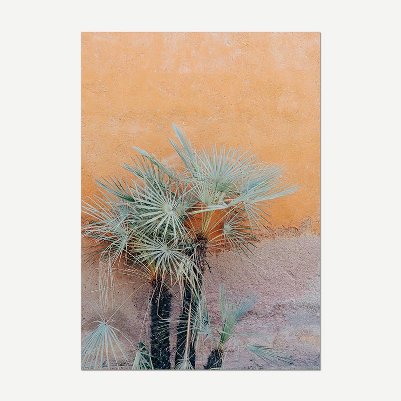 Art print of palm trees against a textured orange and pink background