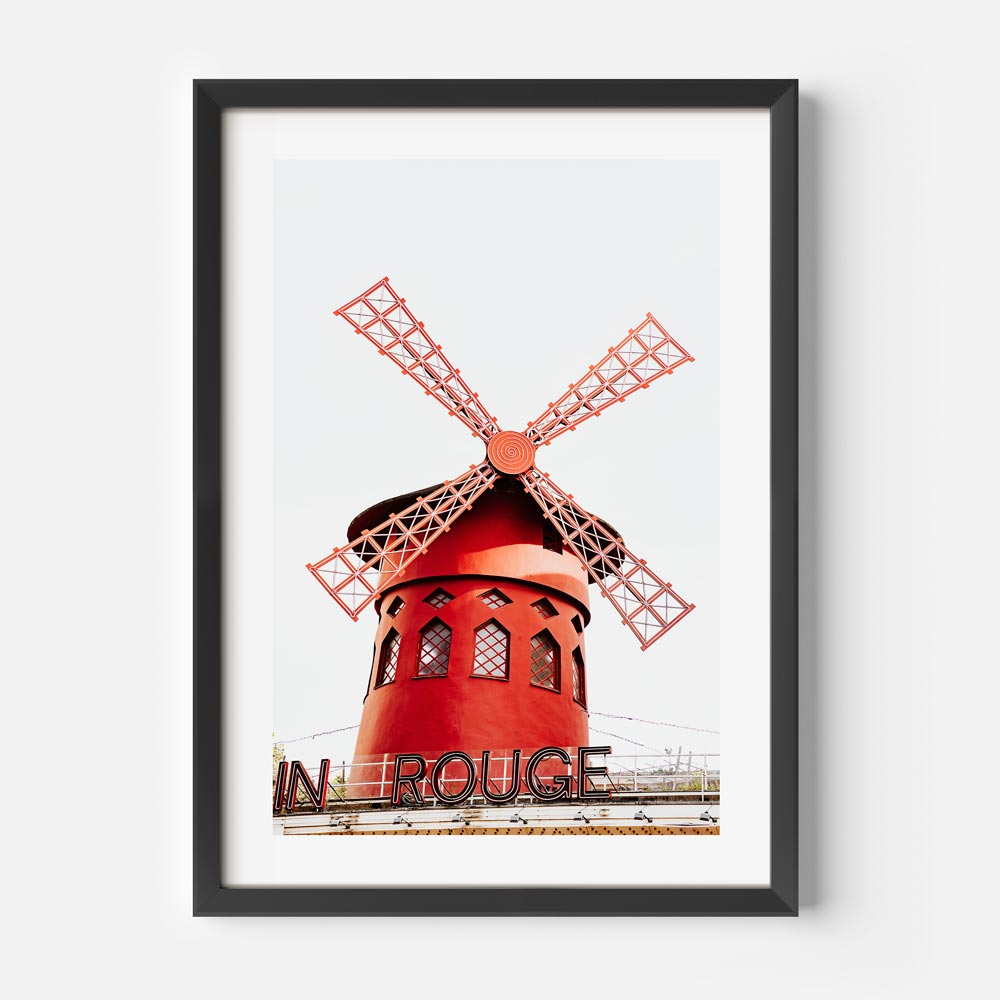 Moulin Rouge at dawn, showcasing the calm and energy of Parisian life, perfect for living room decor.
