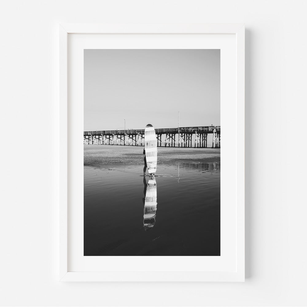 Captivating image of a longboard surfer riding waves in Newport Beach, California - Perfect for wall art.