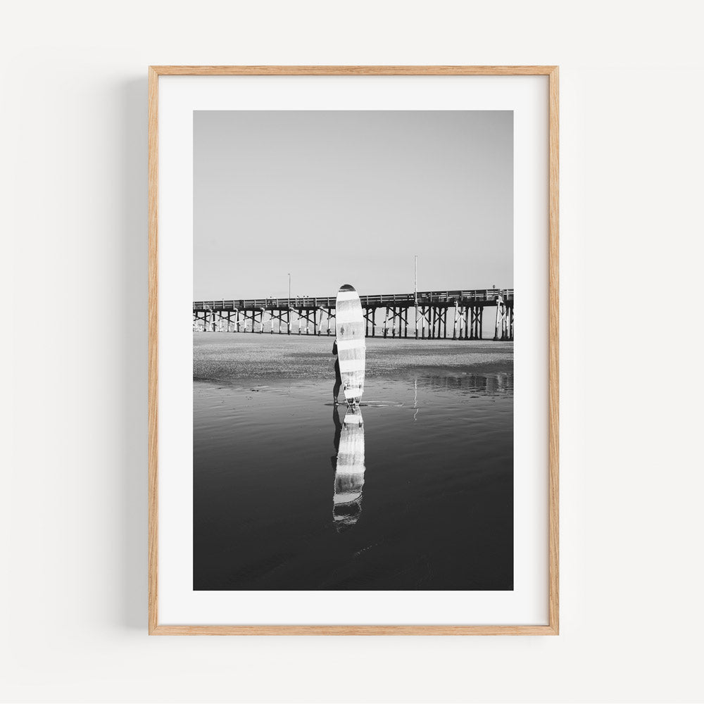 Iconic silhouette of a longboard surfer in Newport Beach, California - Enhance your space with modern wall art.