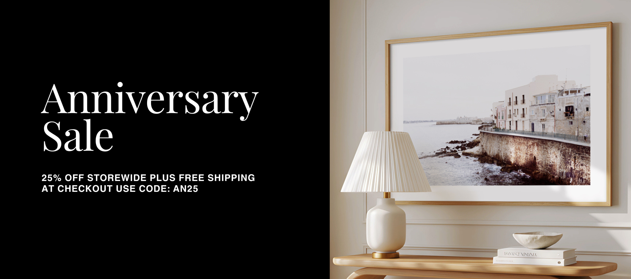 Framed artwork on a wall with a lamp and decor items below, alongside an 'Anniversary Sale' text overlay.