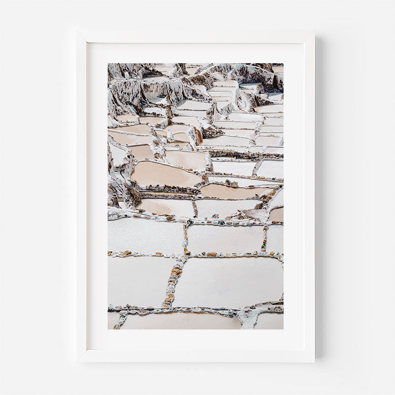 Framed photograph of a stone pathway with a white border on a light gray background