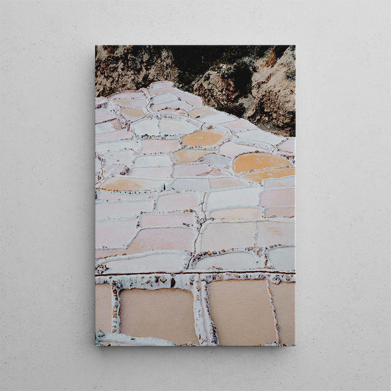 Canvas print of a stone wall with a natural landscape background