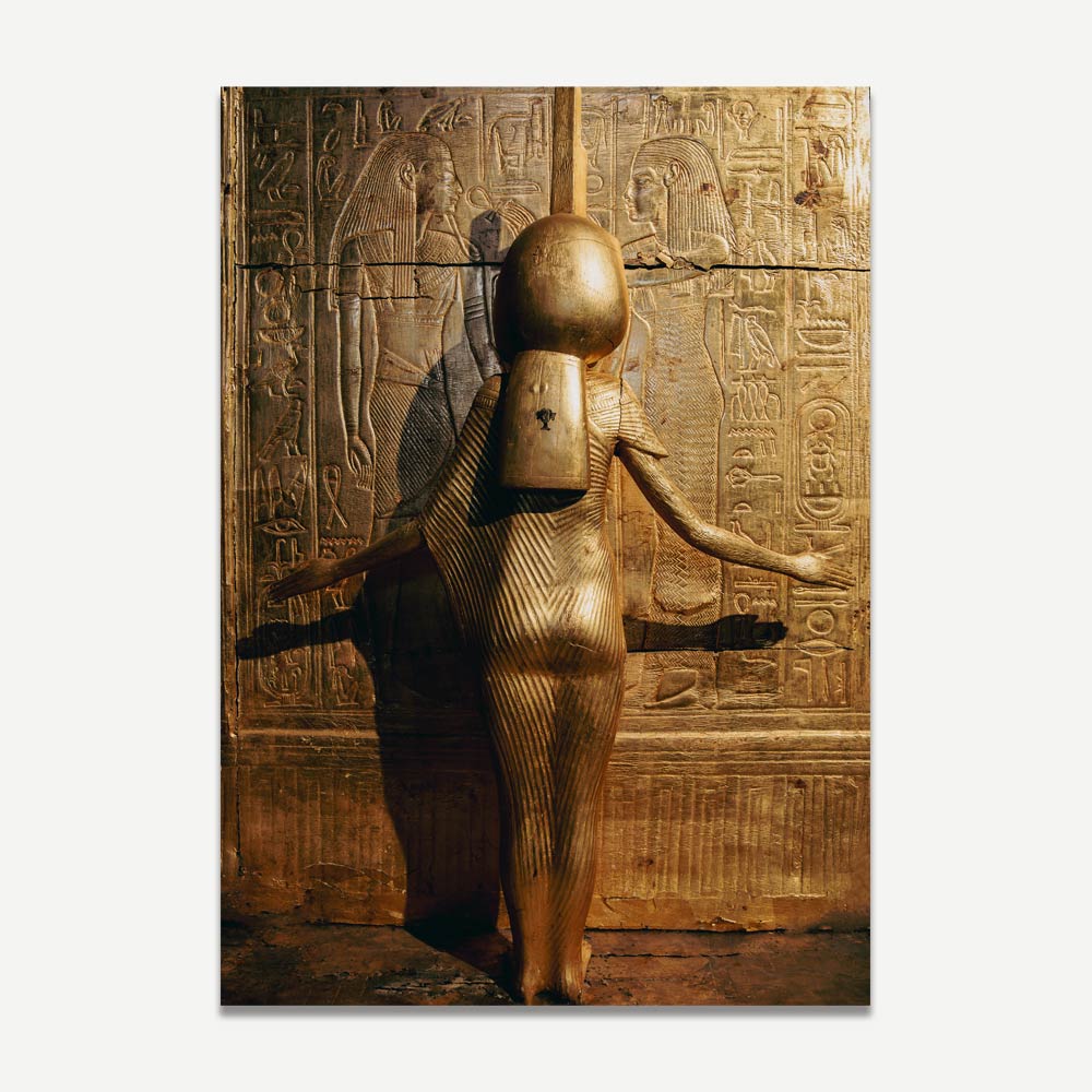 A print of the goddess Isis, depicted in a golden colour against an intricately designed background from the Egypt Museum collection.
