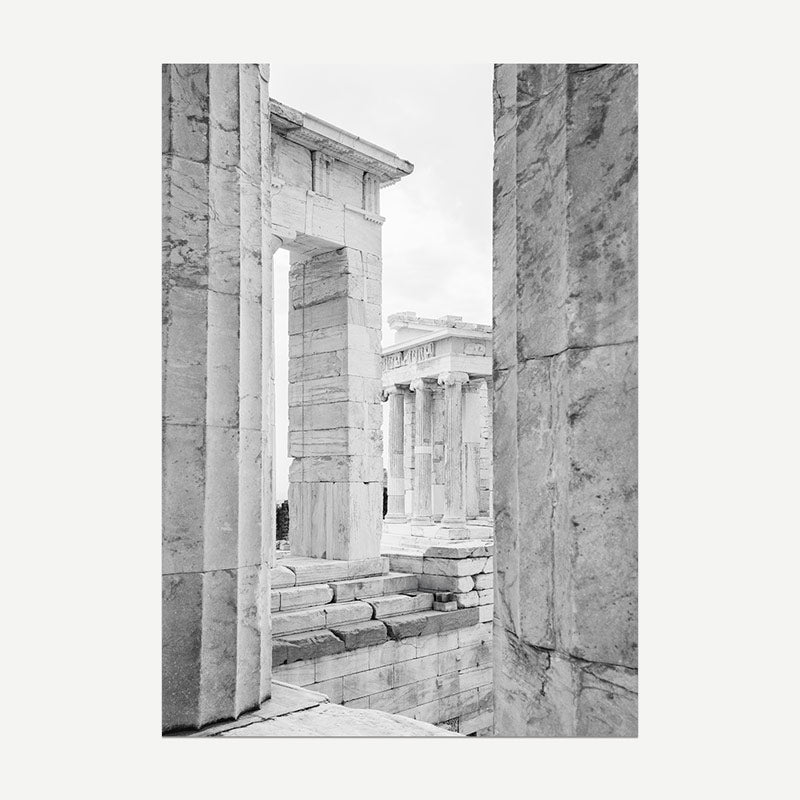 Architectural ruins of a classical building with columns and steps.