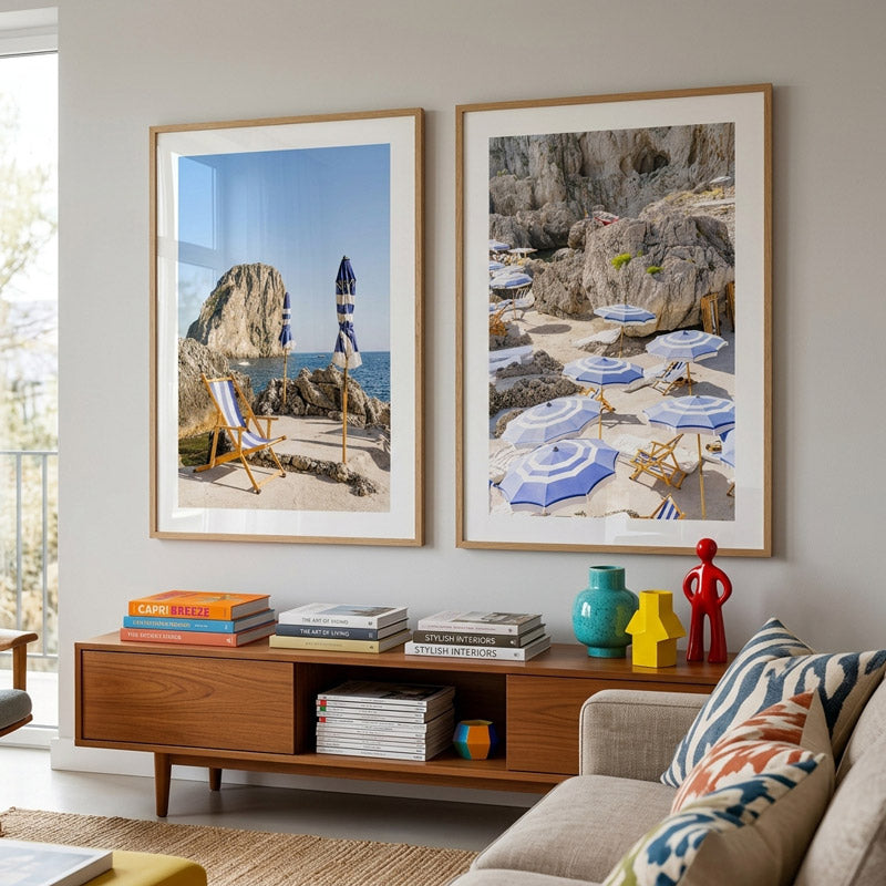 Living room with framed beach photos above a wooden console table.