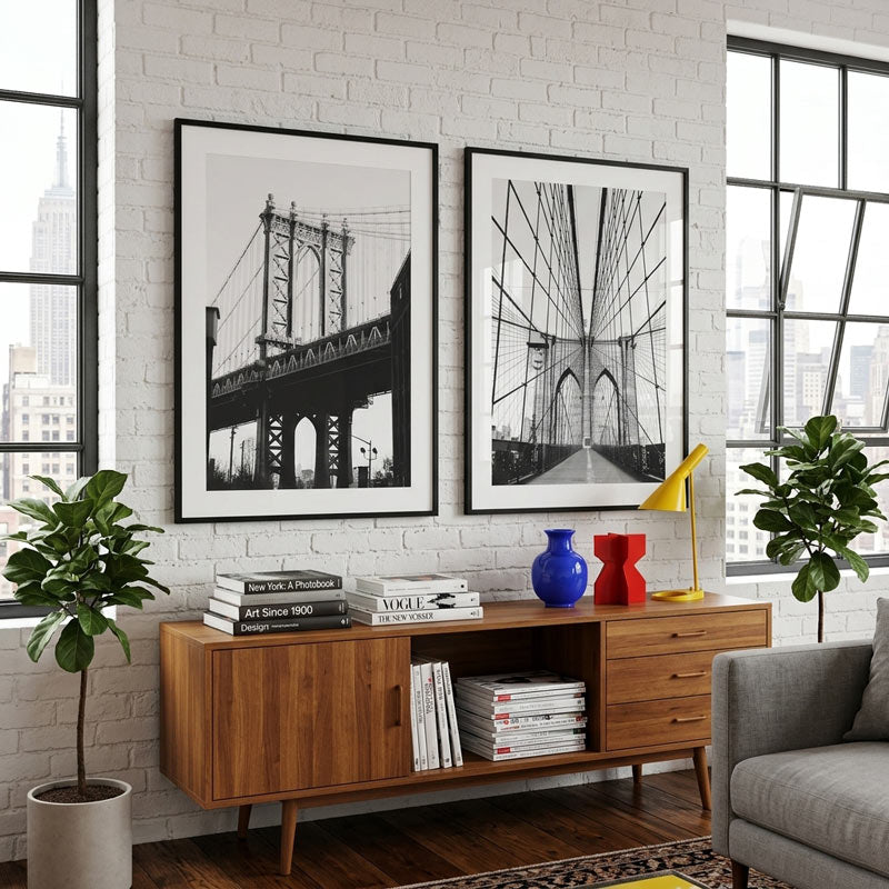 Living room with wooden console table, framed bridge pictures, and decor items.