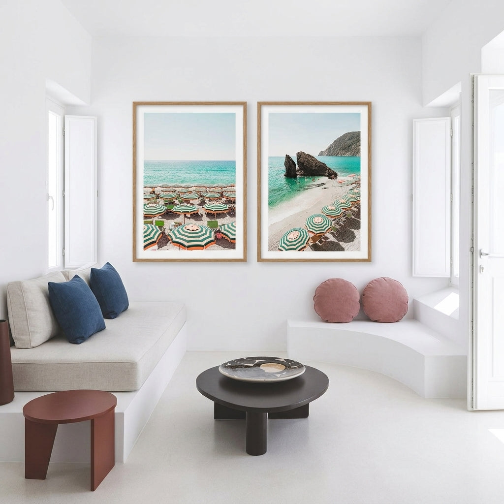 Modern living room with white walls, a white sofa, and decorative pillows.
