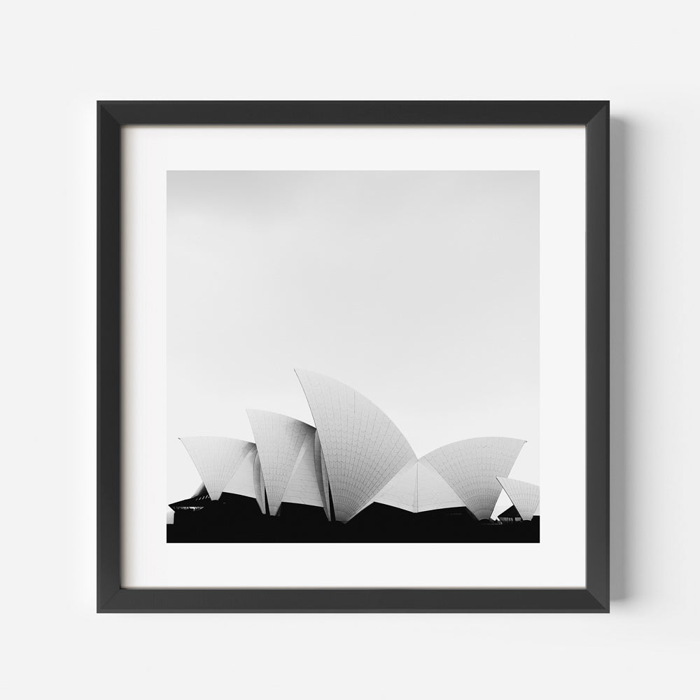 Black and white print of Sydney Opera House" - an elegant artwork showcasing the renowned Sydney Opera House, suitable for framing and display.