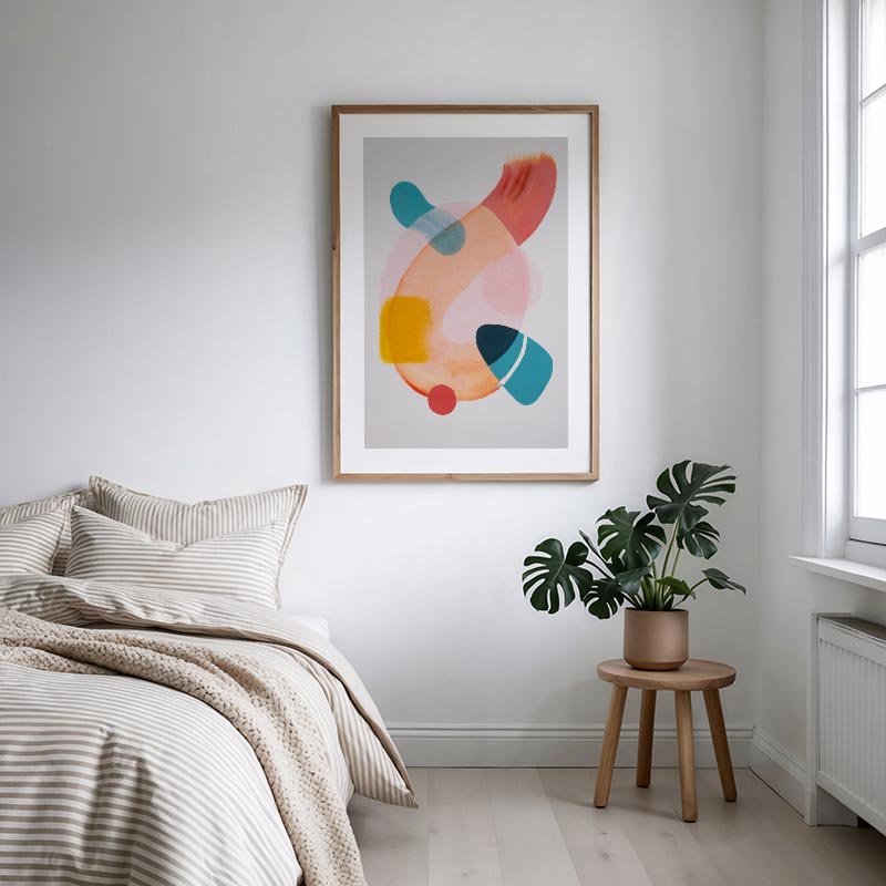 Modern bedroom with abstract art, plant, and bed.