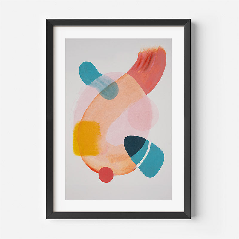 Framed abstract art print with colorful shapes on a light gray background