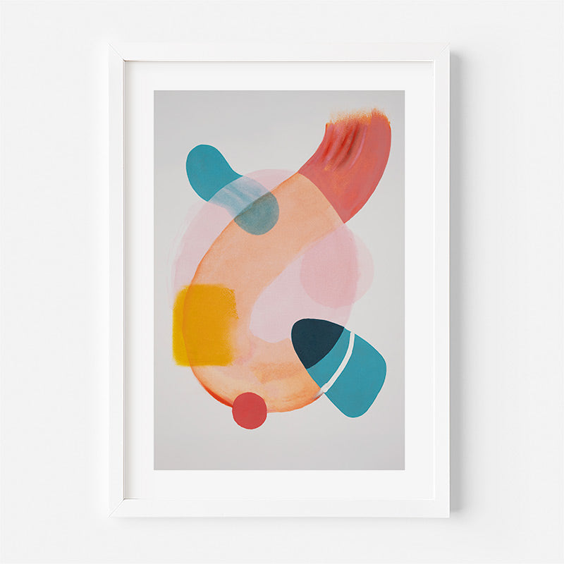 Framed abstract art print with colorful shapes on a light gray background