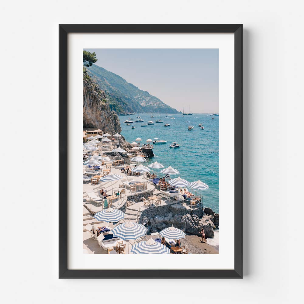 Wall art featuring beach umbrellas and chairs in Positano, Italy. Perfect for home and office decor.