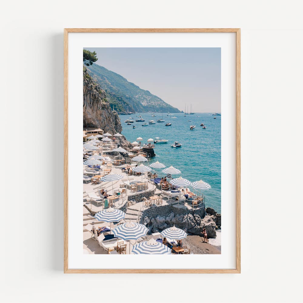 Positano, Italy beach print with umbrellas and chairs. Quality wall artwork for homes and offices.