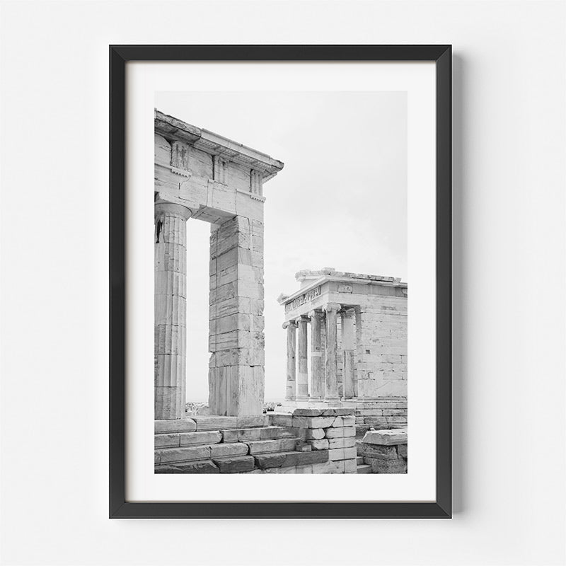 Framed black and white photograph of ancient architectural ruins on a white background