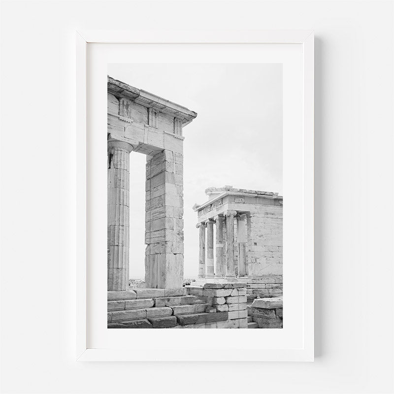 Framed black and white photograph of ancient architectural ruins on a white background