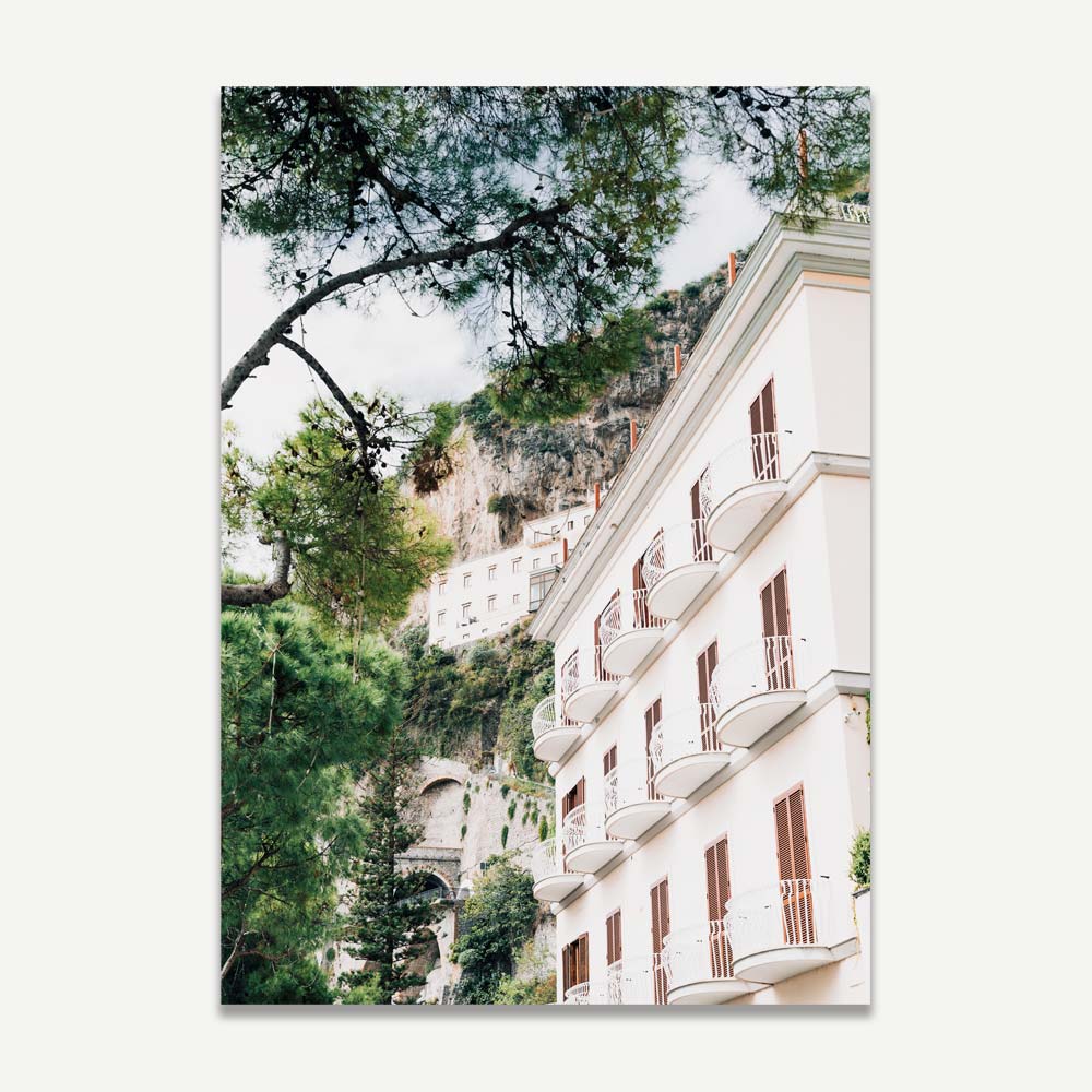 White framed photo of a building in Italy, part of Oblongshop's wall art collection featuring beautiful places globally.
